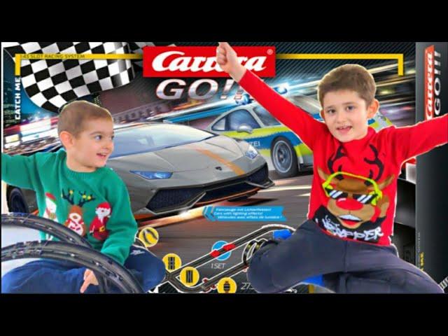 Danyel & Deniz unboxing Carrera go with Lamborghini and Porsche police car racing game Carrera Bahn