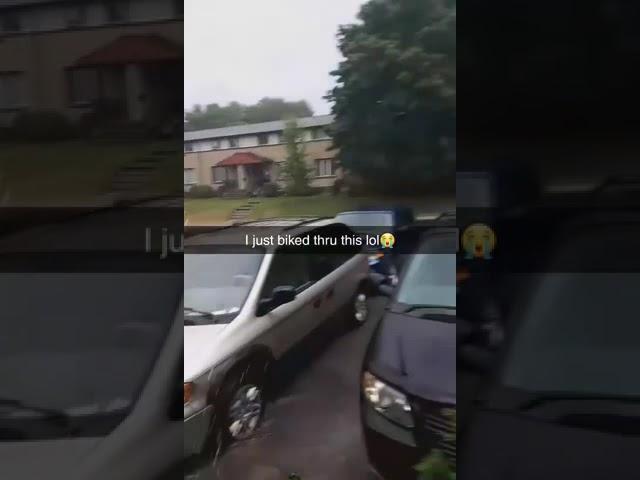 Beige Caravan in the Driveway in the Rain