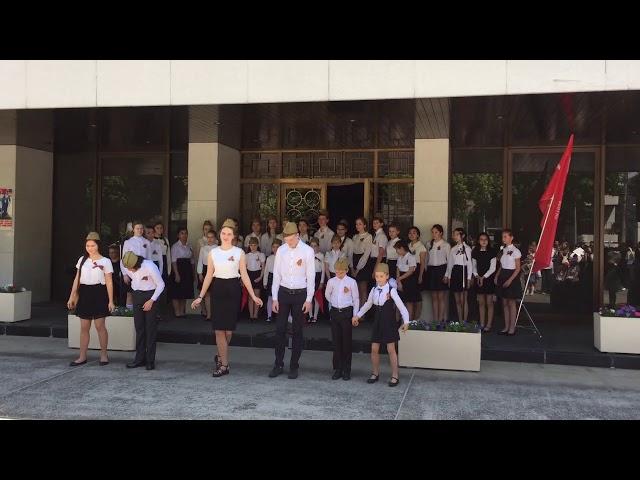 School children waltz on V-Day in Tokyo