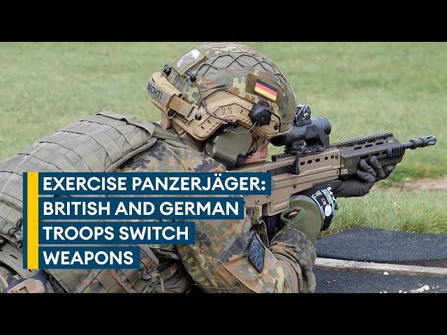 British and German troops try out each other's weapons on tank hunting exercise