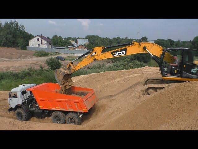 Погрузка самосвала Камаз 43118 экскаватором JCB JS240LC часть 1