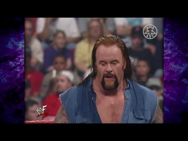 Kane Chokeslams The Undertaker Through The Ring 08/14/00
