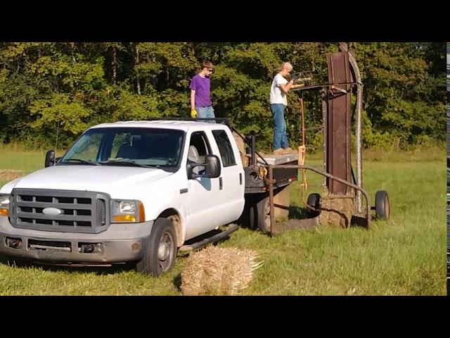 Pop up bale loader