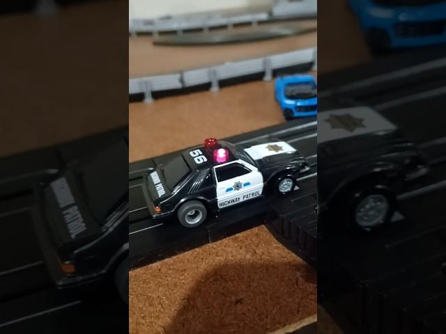 Classic AFX Semi Trucks & Police foxbody Ripping Through the track!
