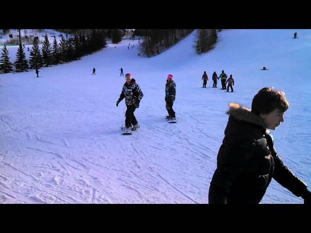 Kid's snowboarding.