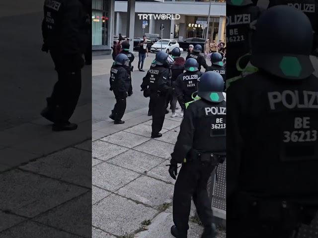 Berlin police forcefully push a female pro-Palestinian protester