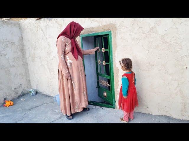 Installing the Magic Cave Door: A single mother secures her sanctuary