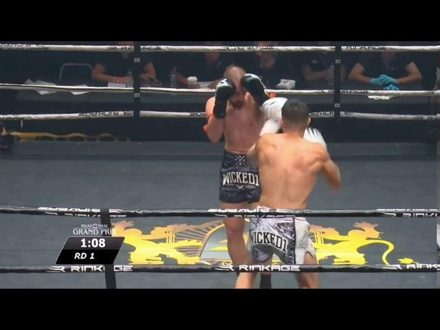 Michael Pham with an amazing head kick and then a spinning elbow from hell!!