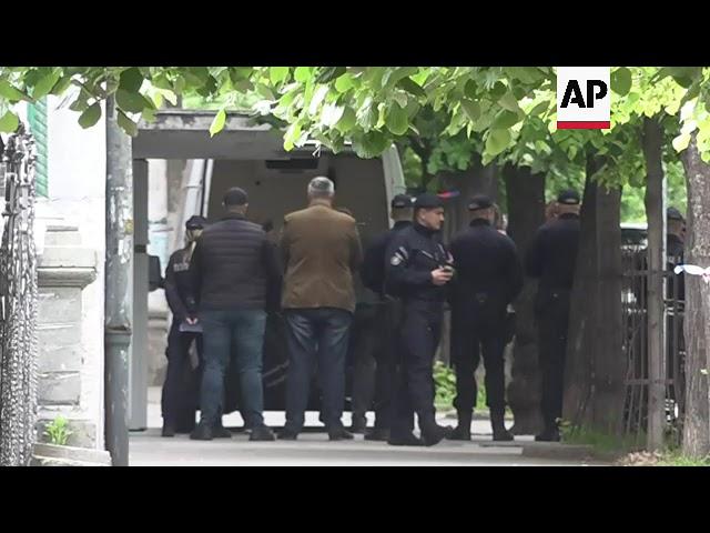 Body bags carried out of Serbia shooting school