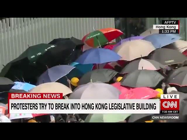 Hong Kong protesters trying to break into government headquarters in major escalation