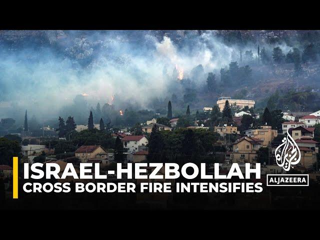 Hezbollah fires 150 rockets at Israel after senior commander killed