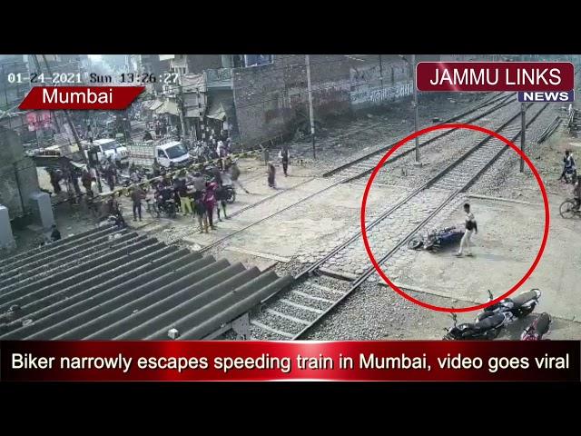 Biker narrowly escapes speeding train in Mumbai, video goes viral