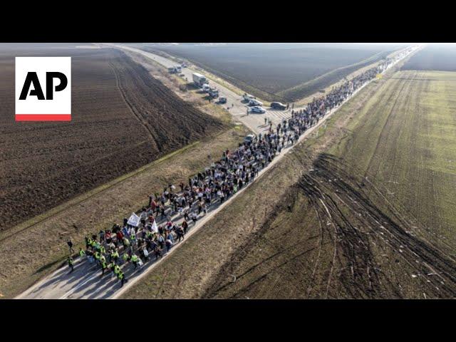 Serbian student protesters march ahead of bridge blockade