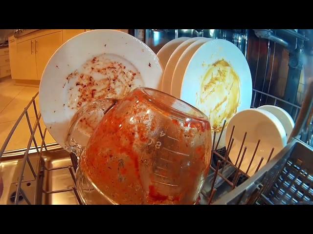 Inside fancy Kitchenaid Dishwasher filled with extra dirty dishes