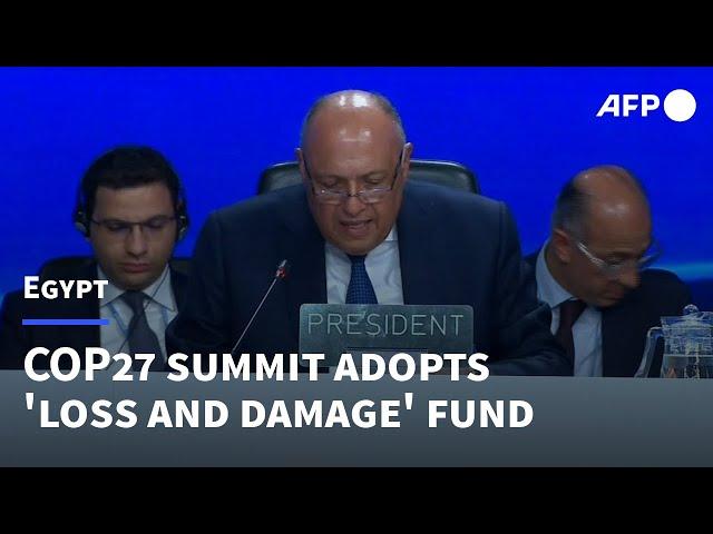 UN climate summit adopts 'loss and damage' fund | AFP