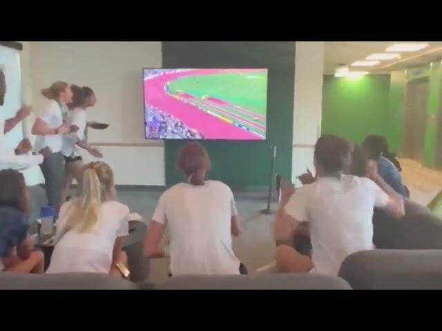 British athletics team celebrate Jake Wightman's historic 1500m gold medal