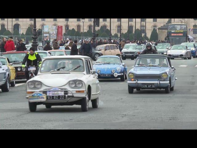 Vintage car enthusiasts take to the streets of Paris | AFP