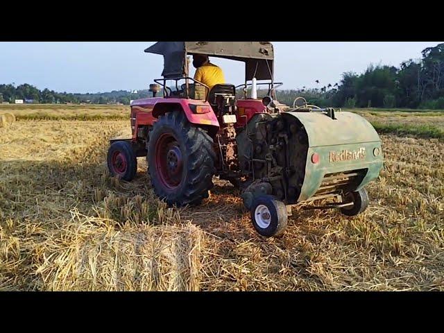 Redlands Round straw Baler working in field. @explorerexpedition.