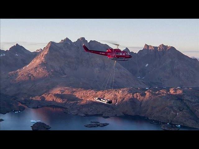 Greenland : A Formula E car speeds across an ice cap in the Arctic Circle