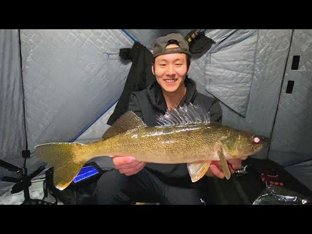 He caught his BIGGEST Walleye ice fishing!