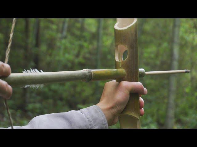 How to make a bamboo bow with a long arrow rest tube and shooting eagle.