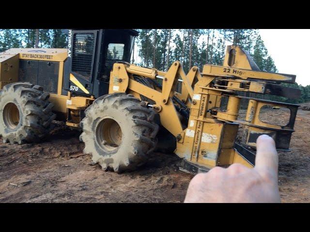 Feller buncher up close and in action.  That's a big feller!  FarmCraft101