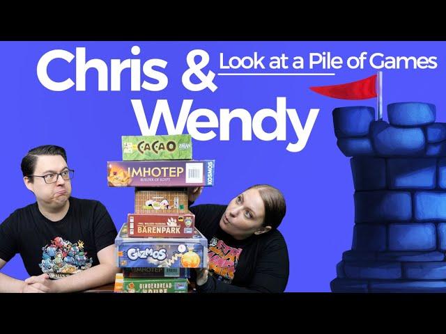 Chris and Wendy Look at a Pile of Phil Walker Harding Games