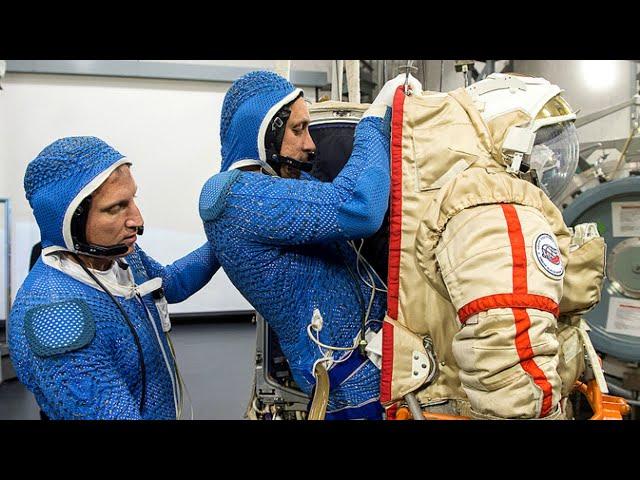 Astronaut Demonstrates How A Space Suit Works