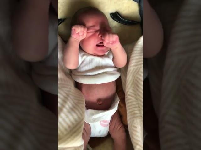 Hungry Newborn Crying//One-week-old baby Finn Tresize is hungry for his morning milk//Gary Tresize//