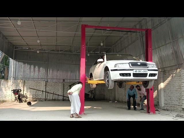 machencal 2 post car lift  gairag Ecupment with complete installation and testing