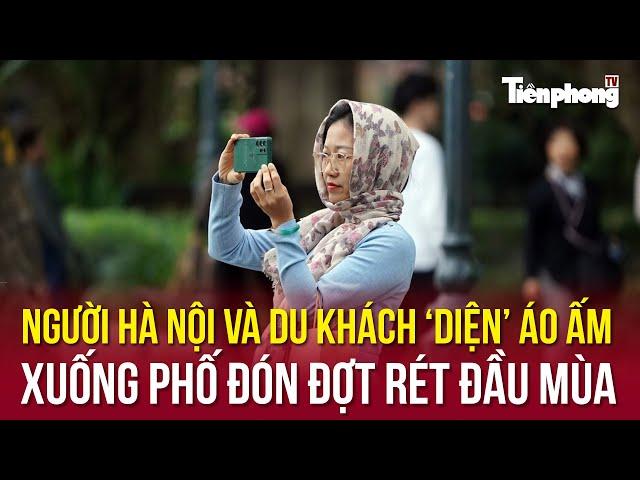 Người Hà Nội và du khách ‘diện’ áo ấm xuống phố đón đợt rét đầu mùa