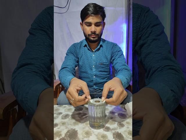 a coin placed on top of a glass of water  #safenote #experiment #hack #magic #scienceexperiment