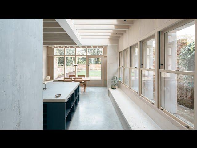 Sunken concrete floor expands Victorian terrace house in London