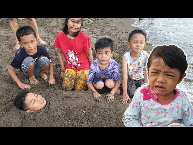 Drama Brother Buried All of Body in the Sand Beach - Abil Fatan Key