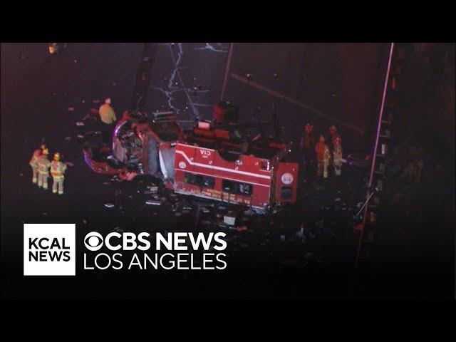 6 firefighters seriously injured after their truck rolls over on Orange County Freeway