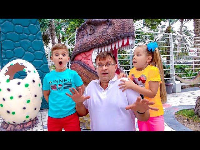 Diana and Roma walk in the Dinosaur park & Museum of Illusions