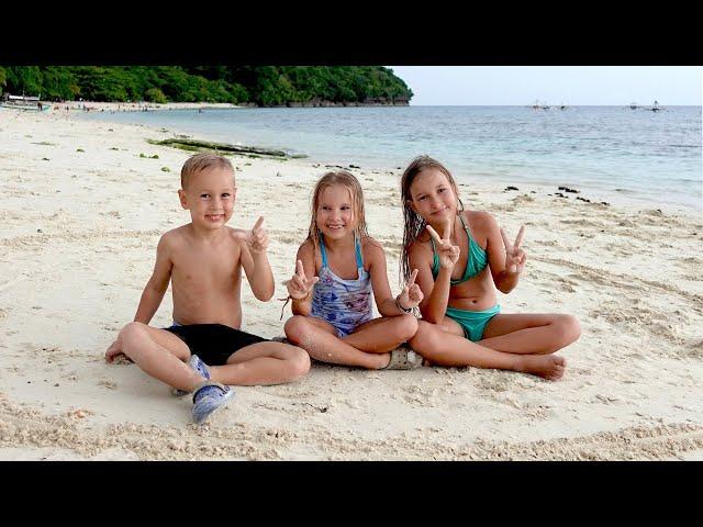 Children playing on the beach 4K