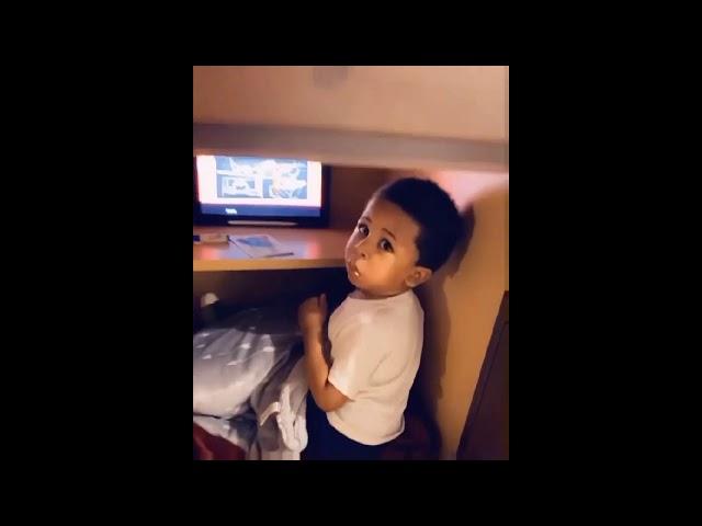 Mom finds 2-year-old chilling with iPad and snacks inside kitchen cabinet. Video is hilariously cute