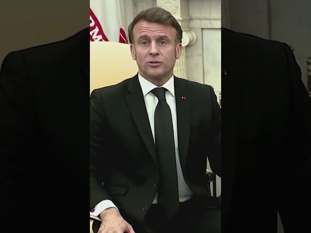 Moment French President Macron's face is pushed away by his wife