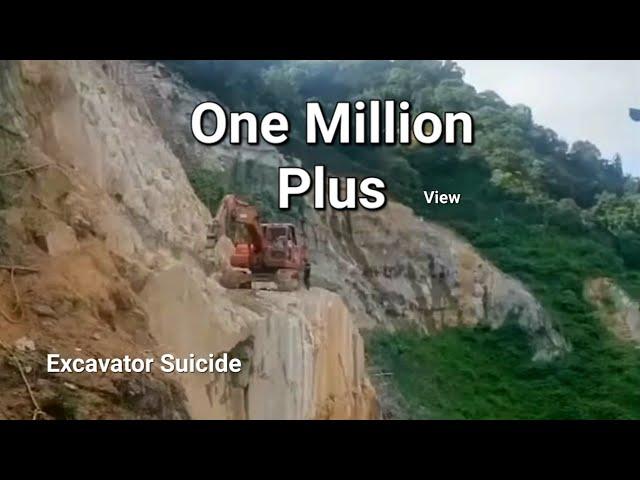 The excavator is falling down from the Mountain