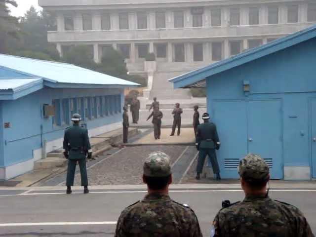 DMZ weird moment North Korea DPRK soldiers picture