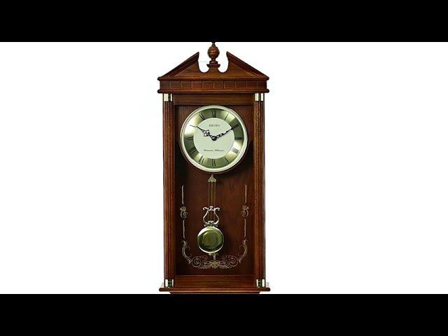 A Classic Pendulum Clock in Oak Wood