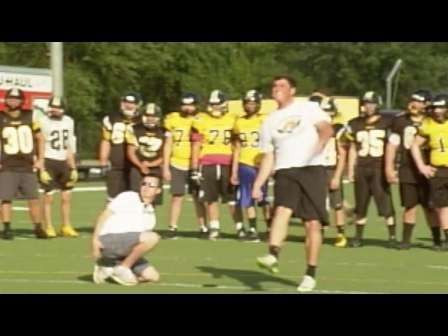 Jamie McCracken hangs out at Johnson Central football practice