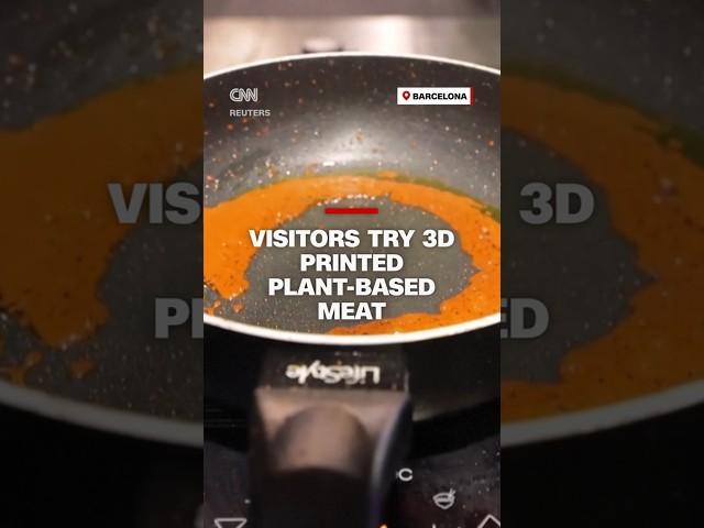 Visitors try 3D printed plant-based meat