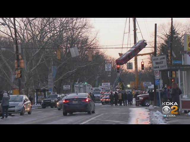 Port Authority Bus Hoisted From Site Of Pittsburgh Bridge Collapse