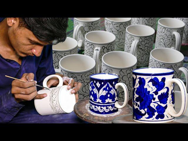 From Clay to Art: A Blue Pottery Artist Demonstrates His Skills on Porcelain Mug