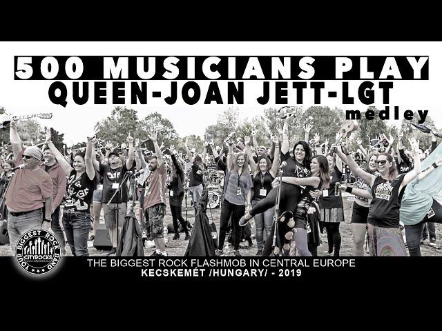 500 rockers play 𝗤𝗨𝗘𝗘𝗡 - 𝗔𝗥𝗥𝗢𝗪𝗦/𝗝𝗢𝗔𝗡 𝗝𝗘𝗧𝗧 - 𝗟𝗚𝗧 (medley) - The biggest rock flashmob in Hungary