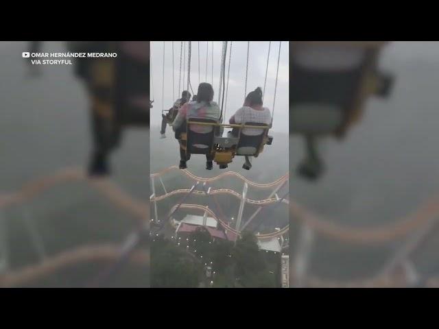 People stuck on ride nearly 250 feet in air at Six Flags Mexico during storm