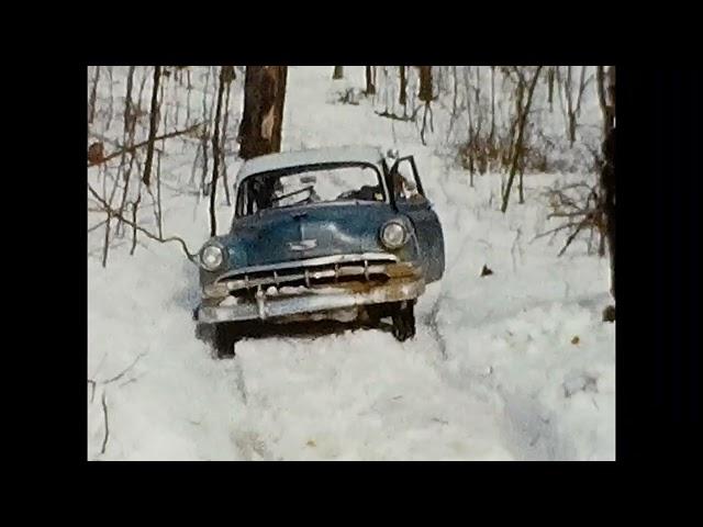 1954 Chevy station wagon - snowy mountain road. Digitized