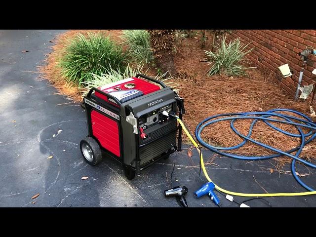Honda EU 7000 inverter generator at 7700 W full load bank test until breaker tripped